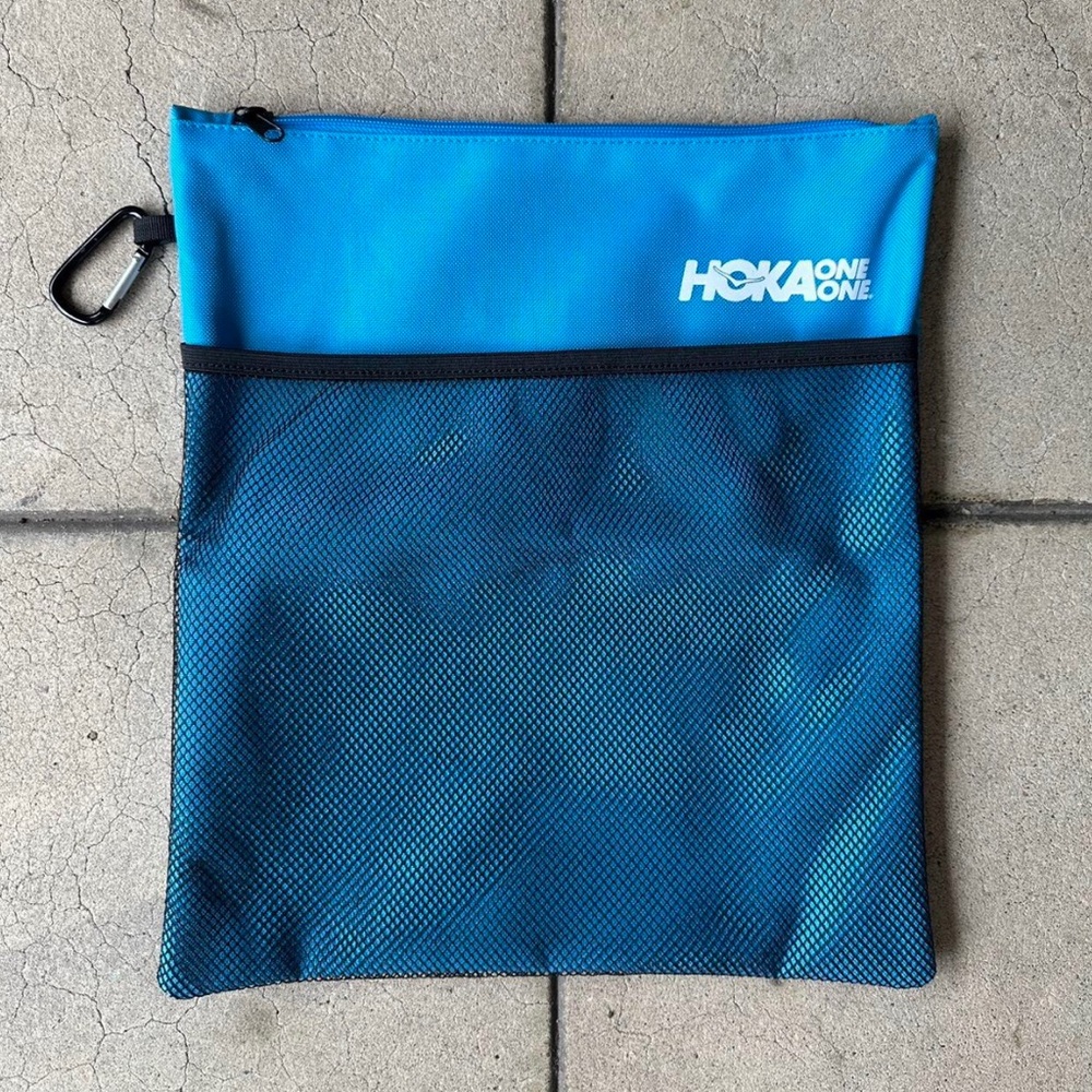 Brand new Hoka wet / dry zipper bag. Accessory gym bag.